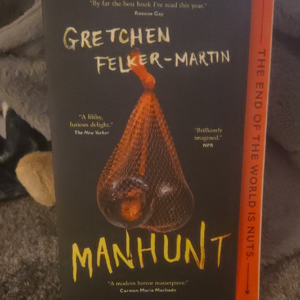 'Manhunt' Book - Black and Orange Cover